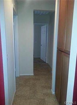 Hallway to Masterbedroom, Laundry room and garage