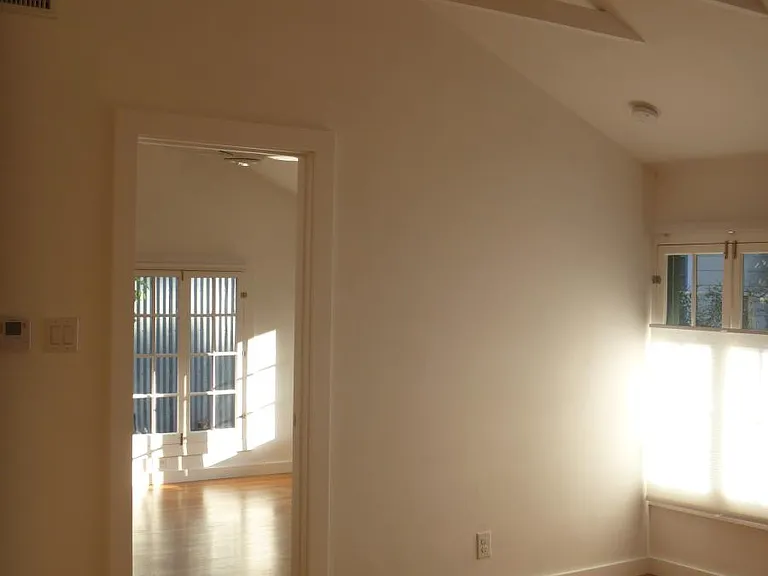 Living room facing bedroom door