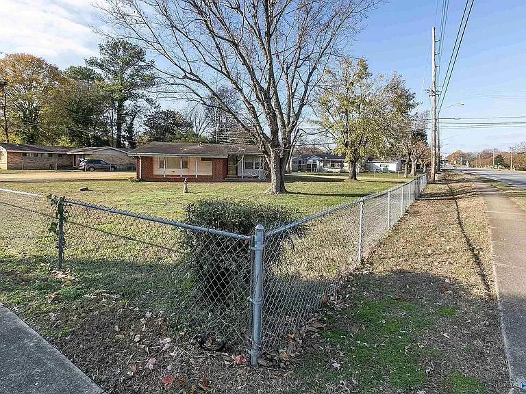 View of the house from the corner of Bob Wallace & Holiday. The trees no longer exist.