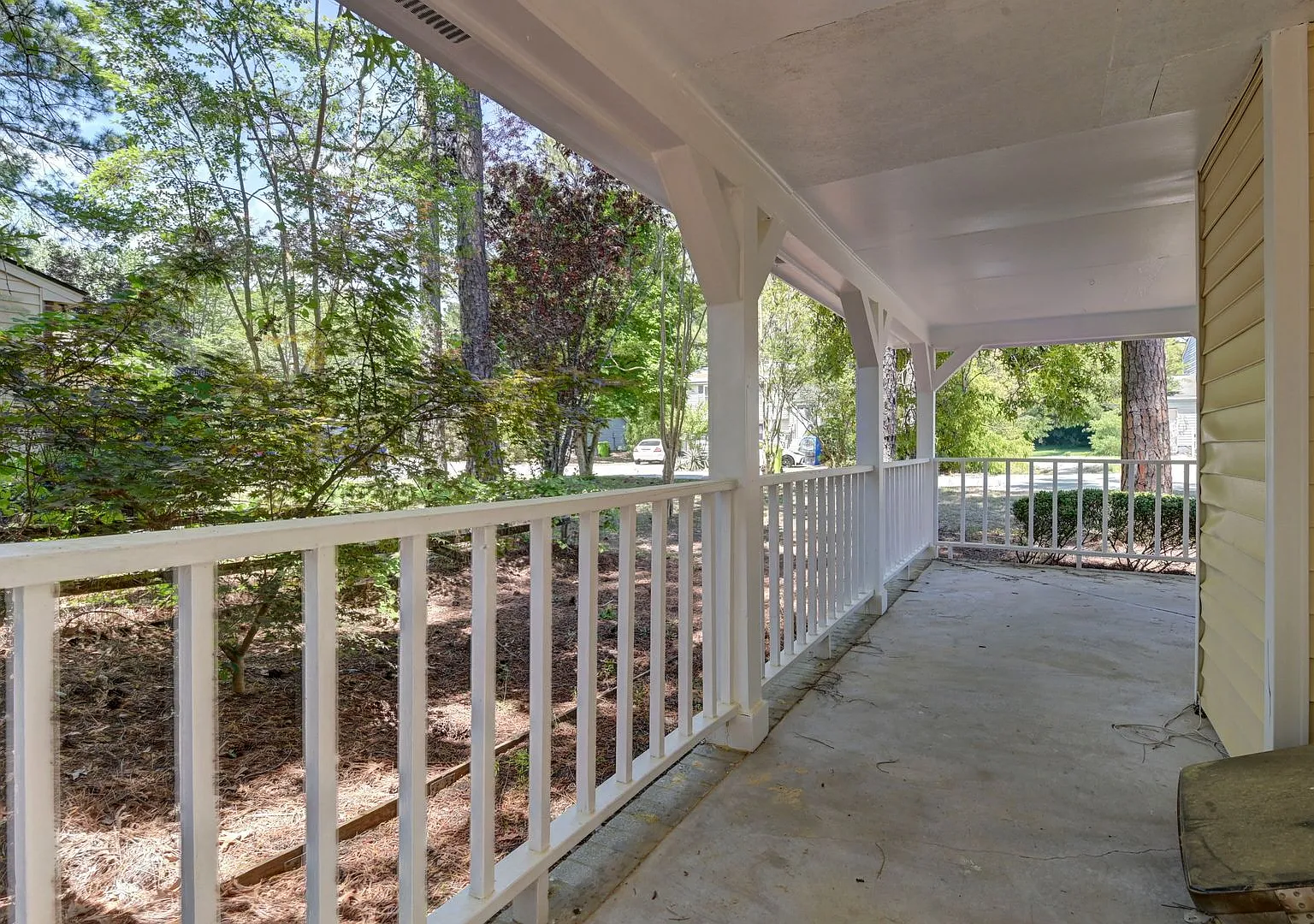 Spacious 3BR Home with Covered Front Porch & Expansive Backyard Near Dining & Shopping — Photo 2