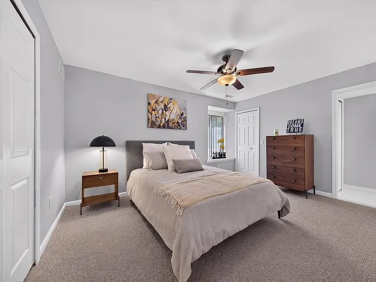 Spacious bedroom at Lakeside Village Apartments in Clinton Township, MI.