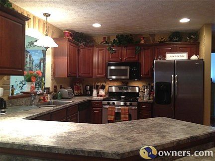 kitchen ,stainless steel appliances remain