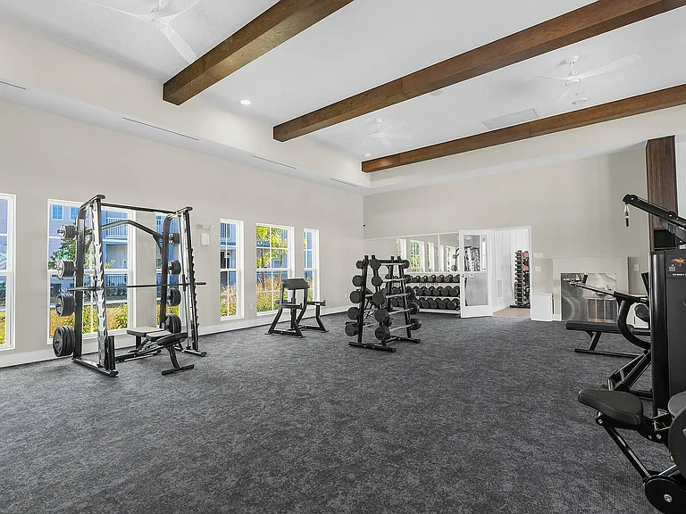 Experience the open and inviting fitness space, designed for optimum workouts.