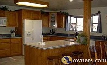 Custom Kitchen - Oak Cabinets/Corian Countertops
