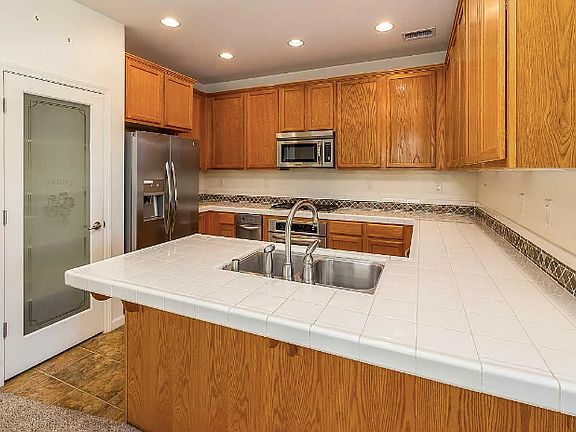 Kitchen with island and walk in pantry