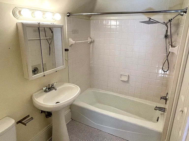 Bathroom with full linen closet