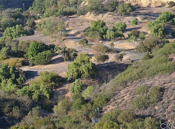 View from above shows the lot and Portuguese Bend Road