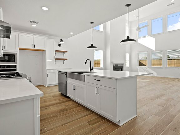 Kitchen with island and pendant lighting