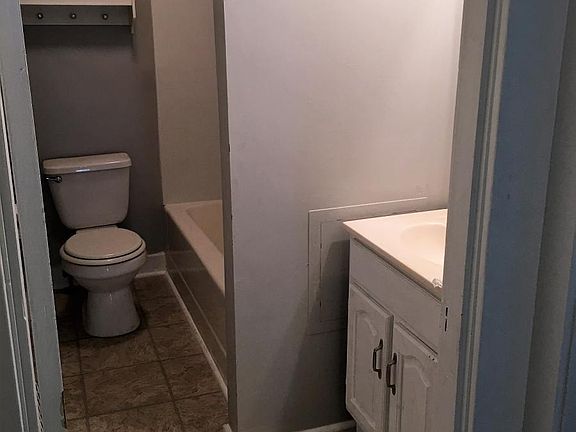 Bathroom with tub and shower