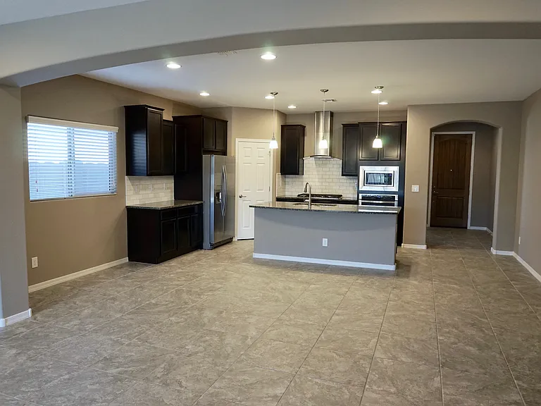 Kitchen center and dinette center. Closet pantry. Appliances included.