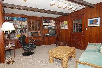 Oversized family room w/solid wood panels.