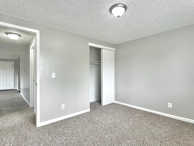 Comfortable bedrooms with generous closet space, providing both privacy and practical storage.