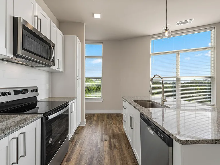 vacant kitchen with windows_