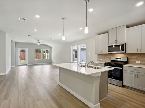 A kitchen in a home in Stewart s Ranch of Conroe, TX.