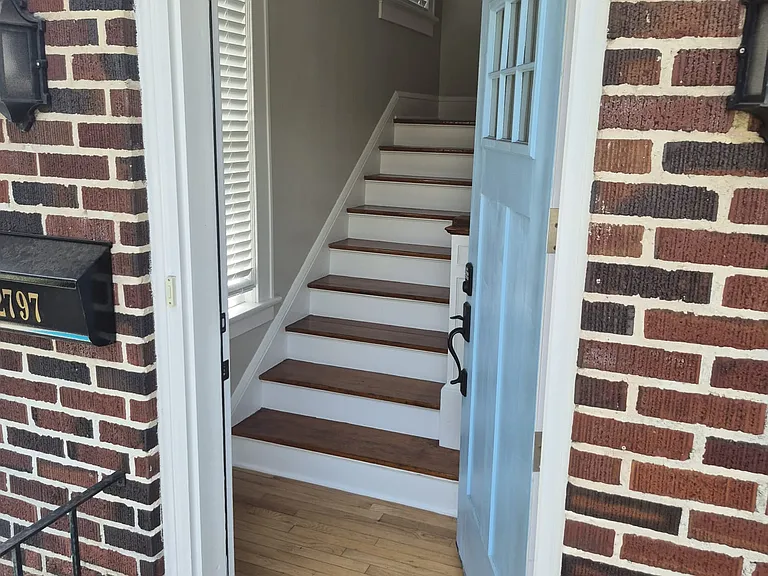 Entry leads directly to stairs to unit