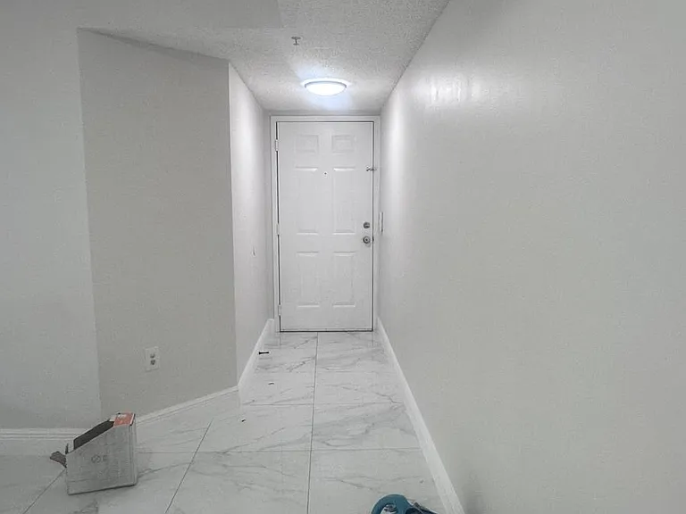 5011 Wiles Rd #207 — Photo 14