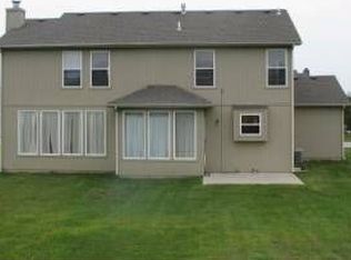 704 Cedar Ridge Dr, Raymore, MO 64083