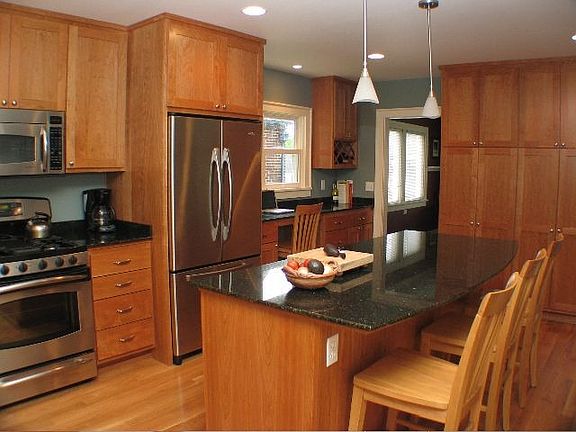 Large island, custom cherry cabinets