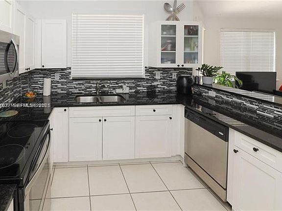 2nd image of 4866 NW 108th Psge #Townhouse 4866