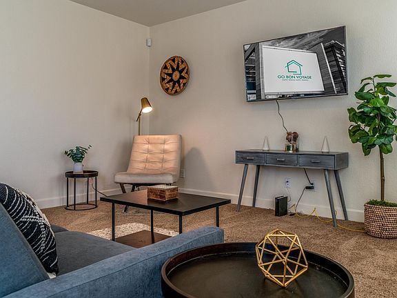 Spacious living room with flat screen Roku tv