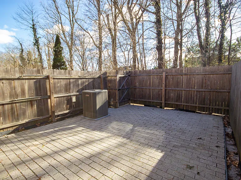 Backs to Wooded Area