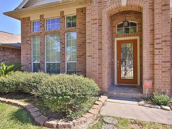 Look at the leaded glass front door.