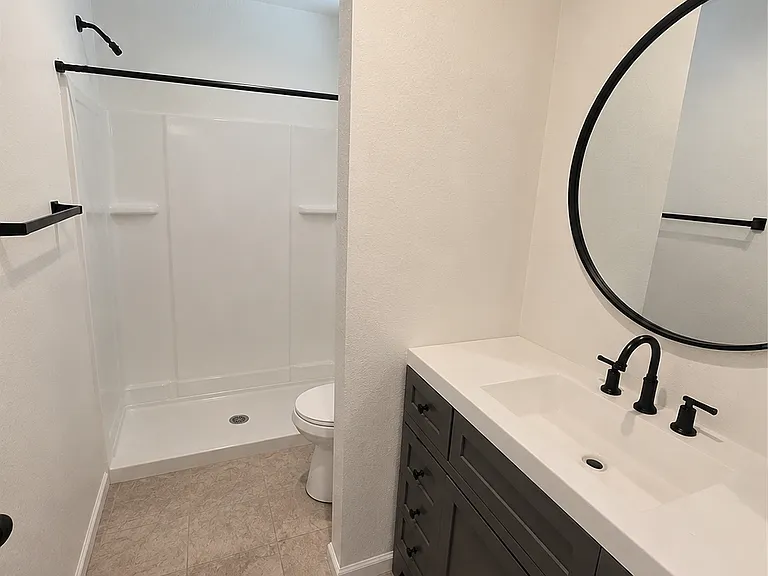 Main Bedroom en suite bathroom vanity and shower