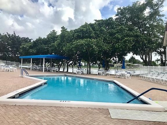 2nd image of 9091 Lime Bay Boulevard #115