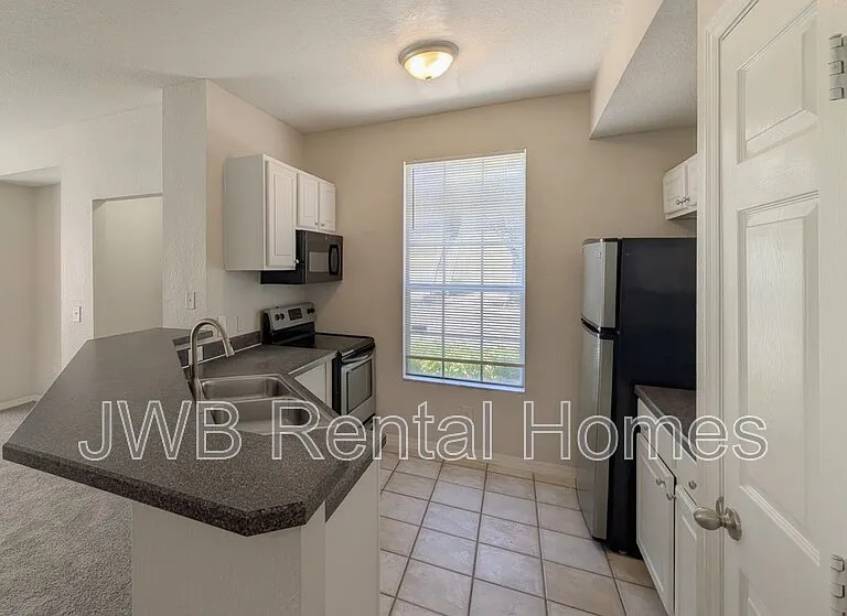 13700 Richmond Park Dr N #1002 — Photo 3