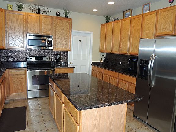 4th image of 21395 E Greenwood Pl