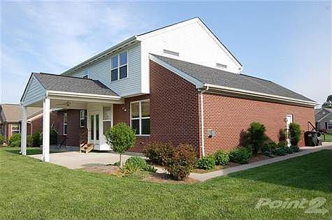 You'll appreciate this covered and enlarged back patio and sidewalk connecting the garage "person-door" to the oversized garage and driveway.