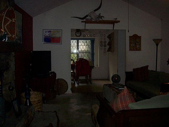 Another view of living room looking into dining area.