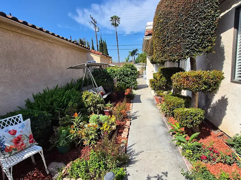nice landscaping with peaceful sitting areas (gardener included)