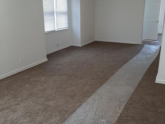 Additional view of large living/dining area