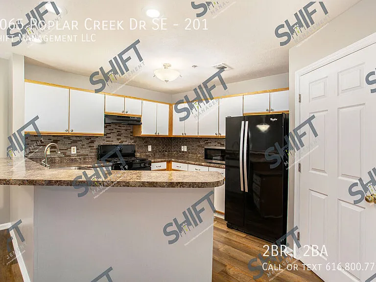 3065 Poplar Creek Dr SE #201 — Photo 2