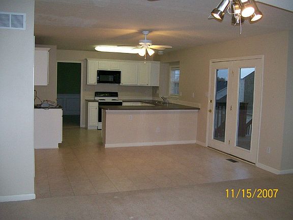 Kitchen opens to FamilyRoom