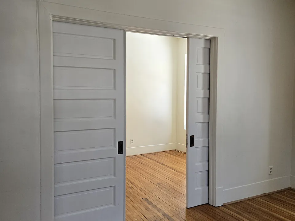 Pocket doors from living room to dining room.