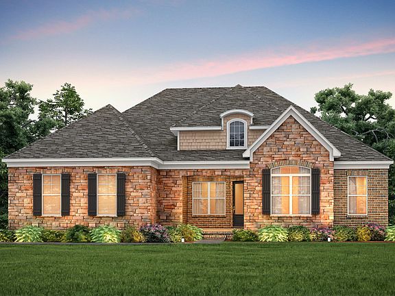 Southampton Exterior 8 features stone, brick, shakes and covered front porch