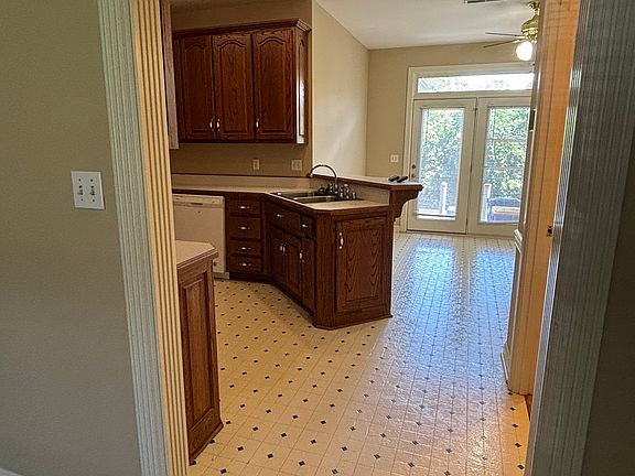 Eat-in kitchen with french doors to patio.