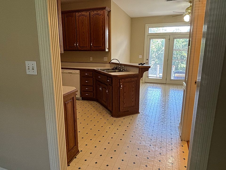 Eat-in kitchen with french doors to patio.