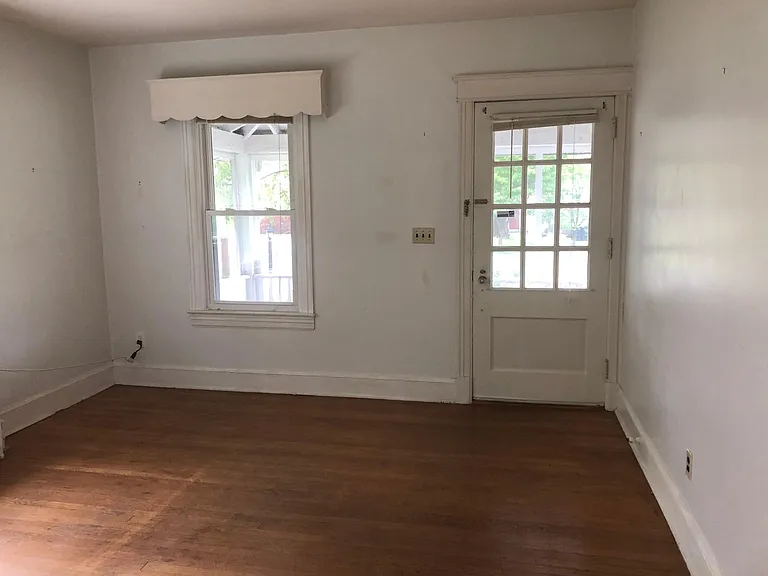 Living room, front door entrance, hardwood flooring