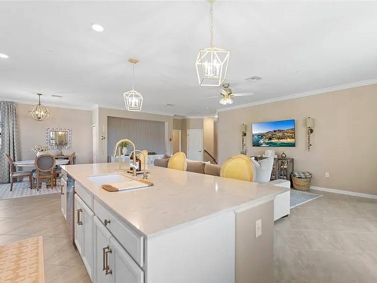 Additional living space photo showing massive kitchen island