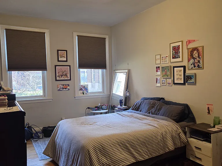 Larger bedroom, fits a king bed. Closet has closet system and extra storage above.
