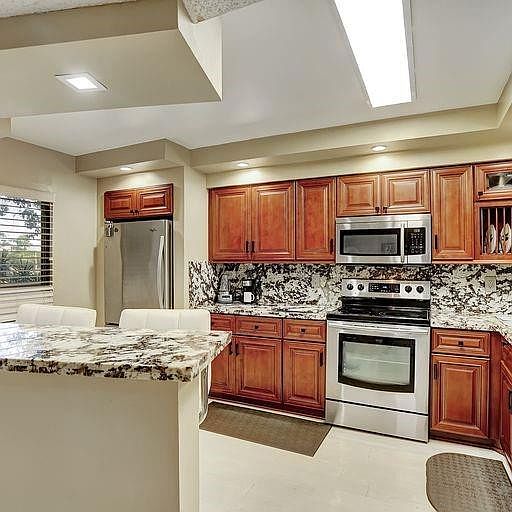 1st image of 2200 S Cypress Bend Drive #208