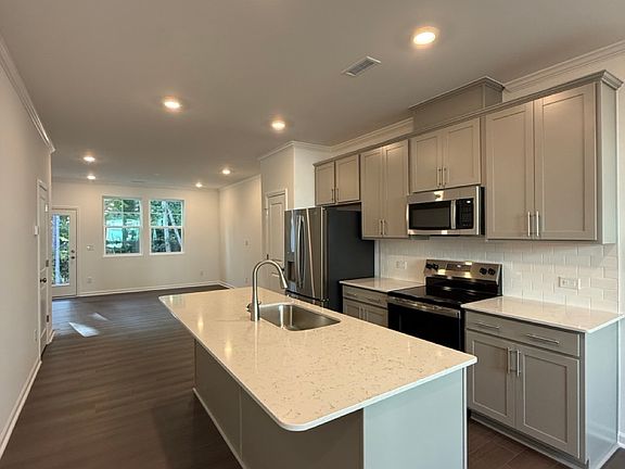 White Couture Grantie with Stainless Steel finish GE Appliances