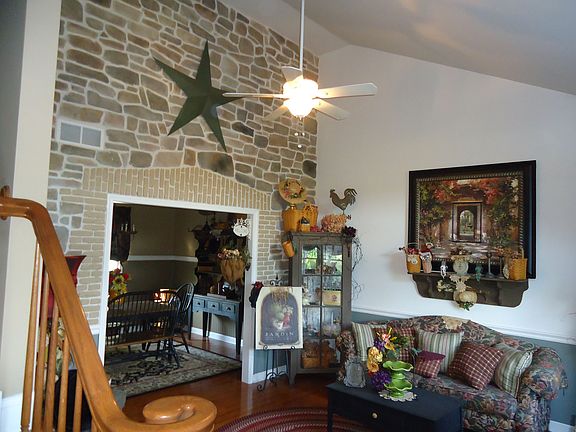 living room with cathedral 