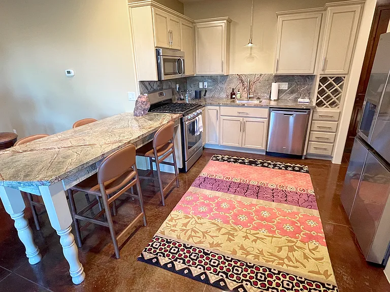 Lower Kitchen and Dining Area off Media Room