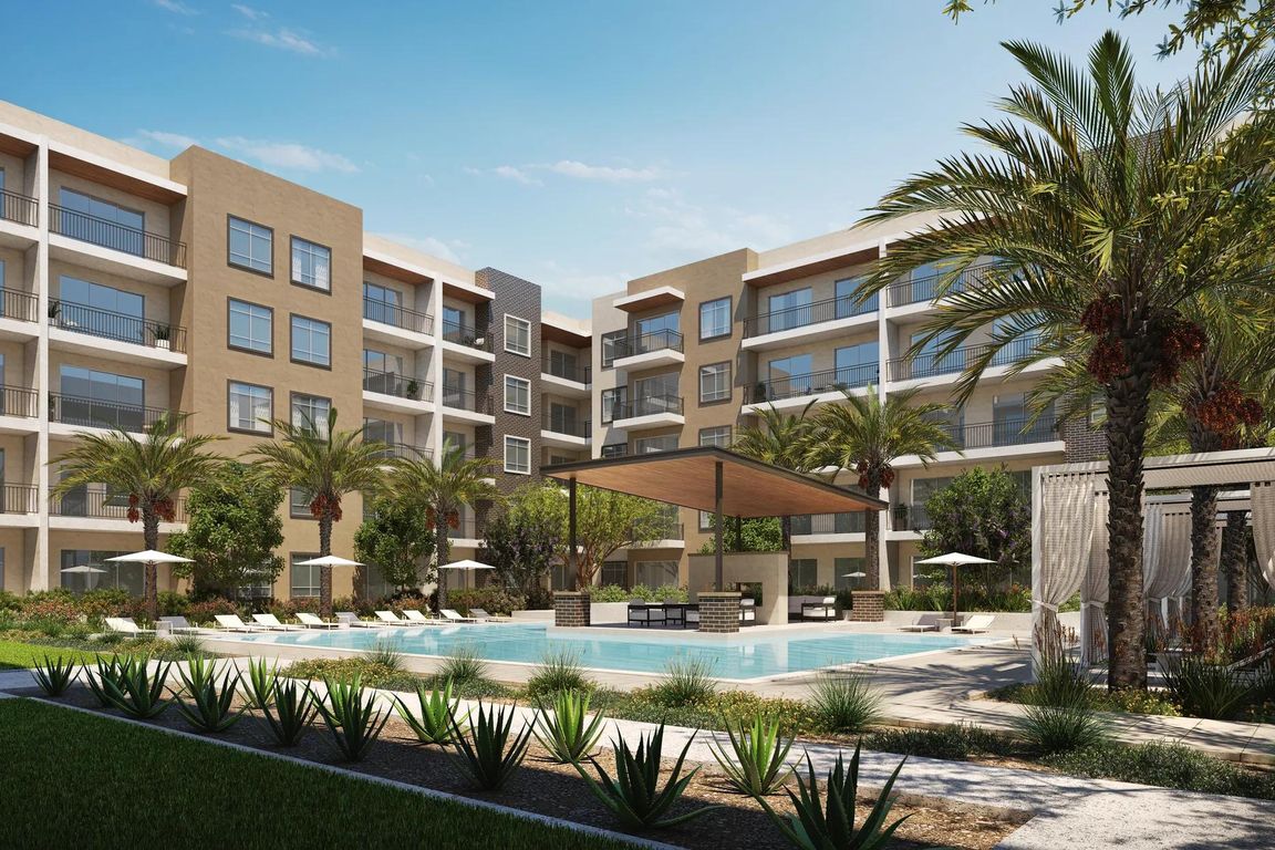 Soak up some sun at the resort-style pool and spa with spacious sundeck and cabanas at Modera Kierland in Scottsdale, AZ.