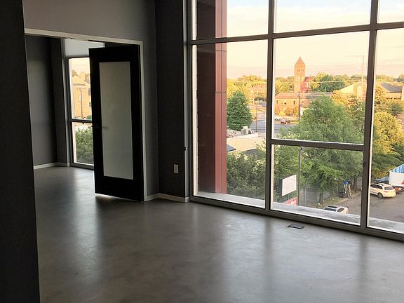 Living area/ double doors to Bedroom