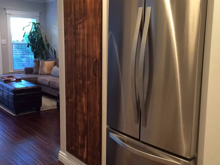 Large pantry and full fridge and freezer